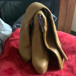 High heel boots never worn.